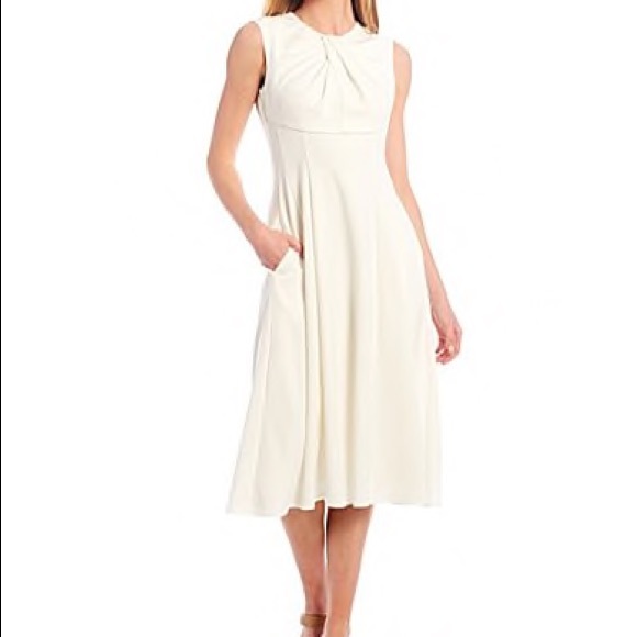Maggy London Dresses & Skirts - NWT Maggy London white swing dress w knotted neck